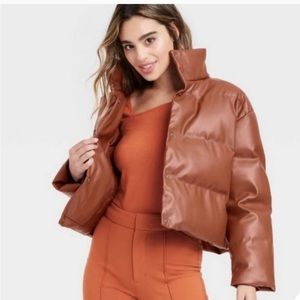 Brown pleather puffer jacket. Beautiful color, slightly cropped fit and warm!